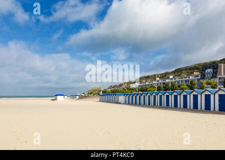 Beach of Boulogn-sur-Mer, France, with rows of beach cabins Stock Photo