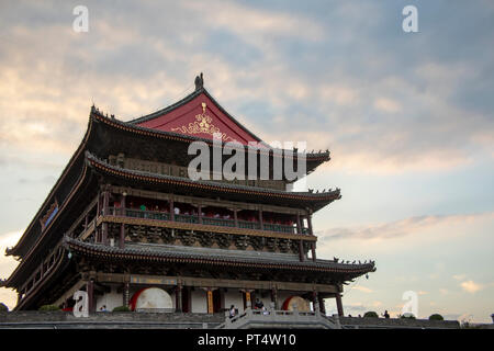 Xi'an, China - September 10, 2018 :  Tourists on levels of Drum Tower in Xi'an, China against blue skies. Stock Photo