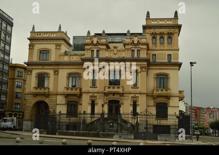 Wonderful Building Besieged Near The Beach Wall Of San Lorenzao In Gijon. Architecture, Travel, Holidays, Cities. July 31, 2018. Gijon, Asturias, Spai Stock Photo