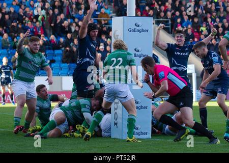 Manchester, England, 6 October 2018. Bryn Evans, Tom Curry and Will Cliff of Sale Sharks, in blue, celebrating after scoring a try against Newcastle Falcons during their Gallagher Premiership match at A J Bell Stadium. Credit: Colin Edwards/Alamy Live News. Stock Photo