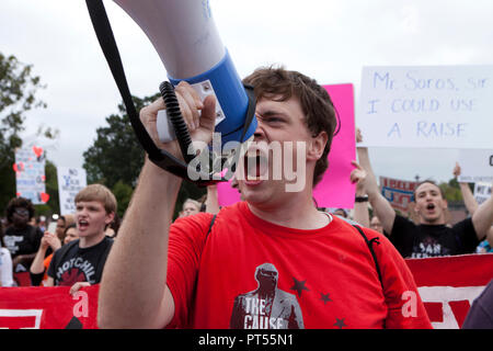 Washington, USA, 6th Oct, 2018: On the day of the final vote to confirm Brett Kavanaugh to the US Supreme Court, thousands of democrat activists protest in front of the Supreme Court building and the US Capitol. Pictured: Man screaming into bullhorn against Justice Kavanaugh.  Credit: B Christopher/Alamy Live News Stock Photo