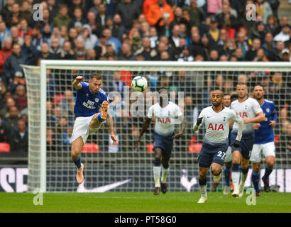 London, UK. 6th Oct, 2018. Joe Ralls (L) of Cardiff offloads the ball during the English Premier League match between Tottenham Hotspur and Cardiff City at the Wembley Stadium in London, Britain on Oct. 6, 2018. Tottenham won 1-0. Credit: Marek Dorcik/Xinhua/Alamy Live News Stock Photo