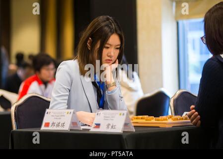 Markham, Canada. 6th Oct, 2018. Lang Qiqi of Team China Sichuan competes during the 3rd World Xiangqi Team Open in Markham, Canada, Oct. 6, 2018. With above 100 players, 22 teams from around the world, this three-day biennial event kicked off on Saturday in Canada. Credit: Zou Zheng/Xinhua/Alamy Live News Stock Photo