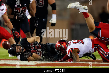 October 06, 2018: Stanford Cardinal tight end Kaden Smith (82) loses the ball after being brought down by Utah Utes defensive back Corrion Ballard (15), during a NCAA football game between the Utah Utes and the Stanford Cardinal at the Stanford Stadium in Stanford, California. Valerie Shoaps/CSM Stock Photo