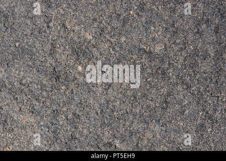 Close up macro view of light gray rough volcanic stone surface. Detailed natural background or texture taken in natural environment in crater of activ Stock Photo