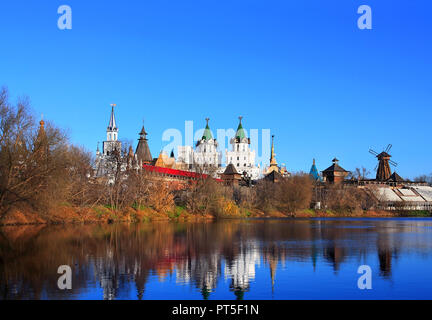 Ancient russian kremlin with colorful towers on the banks of the pond Stock Photo