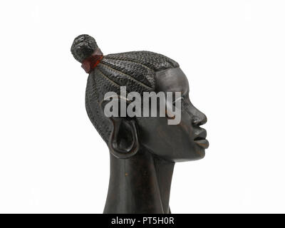 side view of african antique black ebony head of a woman isolated on white background Stock Photo