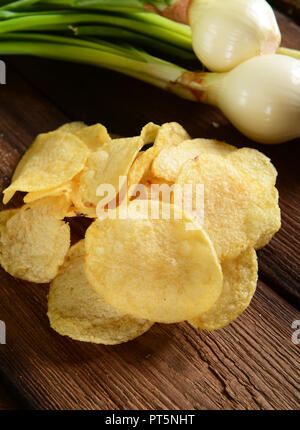 Potato chips- spring onion flavour Stock Photo