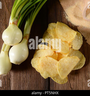 Potato chips- spring onion flavour Stock Photo