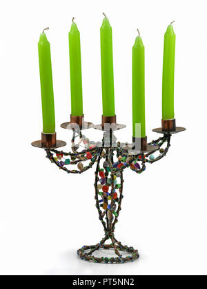 abstract colorful candle holder, candlestick with five green candles isolated on white background Stock Photo