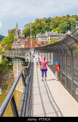 Appalachian Trail walkway on railroad bridge over Upper Potomac River in Harpers Ferry National Historical Park in West Virginia Stock Photo