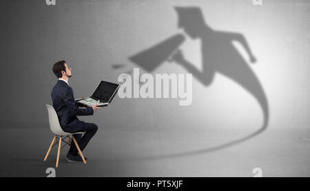 Small businessman staying and offering stuffs to his bossy yelling shadow  Stock Photo