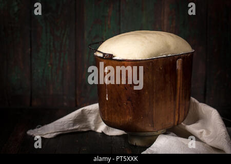 dough rises in the bowl Stock Photo