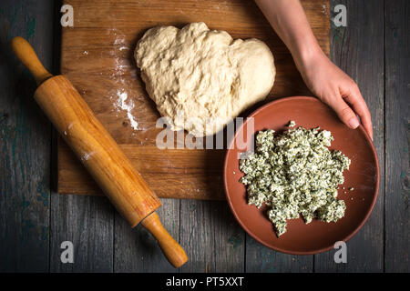 dough and cottage filling Stock Photo