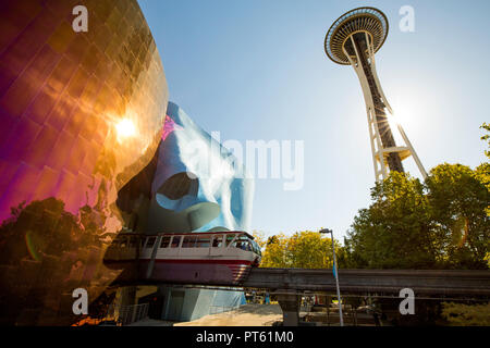 Seattle Monorail and Seattle Space Needle with MoPOP, Museum of Pop Culture.