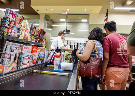 St. Saint Petersburg Florida,Publix Grocery Store supermarket,inside interior,product products display sale,magazines,checkout cashier line queue conv Stock Photo