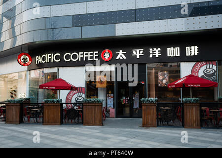 6 October 2018, Wuhan China : Exterior of Pacific coffee shop with name and logo in Wuhan China Stock Photo