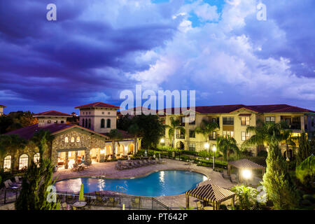 Florida,Davenport,Bella Piazza,rental condominiums,pool deck area,night evening dusk,dusk,FL180731220 Stock Photo