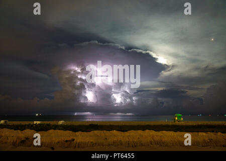 Miami Beach Florida,Atlantic Ocean,night,weather thunderstorm storm lightning,clouds,FL180731255 Stock Photo