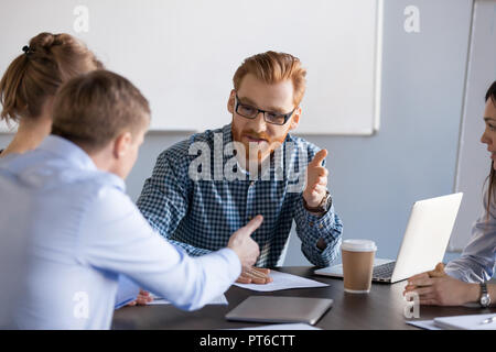 Serious business men having discussion, dispute or disagreement  Stock Photo