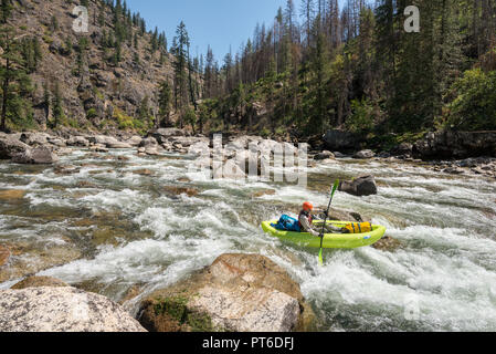 Paddling an inflatable kayak on Idaho's Selway River. Stock Photo