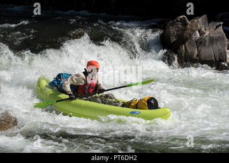 Paddling an inflatable kayak on Idaho's Selway River. Stock Photo