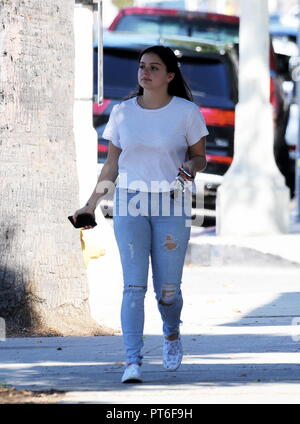 ariel winter seen wearing 'the office' sweatshirt and leggings while out  shopping at cvs in studio city, california-051120_4