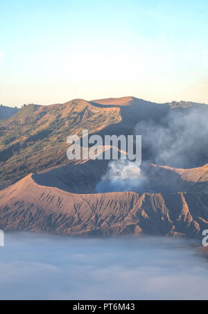 The top of Mt. Bromo and the Tengger Semeru caldera from Mount Penanjakan, Indonesia. this here is one of the destination to travel.  the line of the  Stock Photo