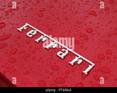 The logo word 'Ferrari' in Chrome on the boot of the Ferrari California Stock Photo