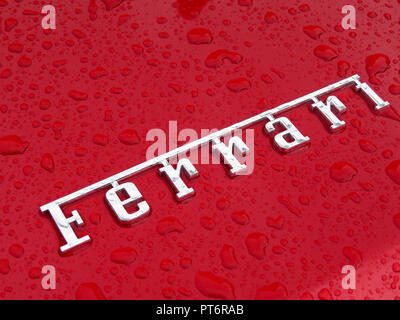 The logo word 'Ferrari' in Chrome on the boot of the Ferrari California Stock Photo