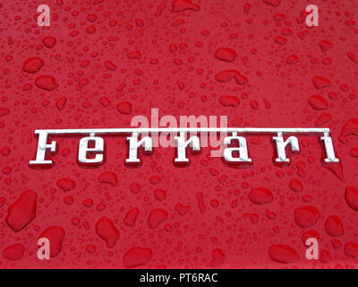 The logo word 'Ferrari' in Chrome on the boot of the Ferrari California Stock Photo