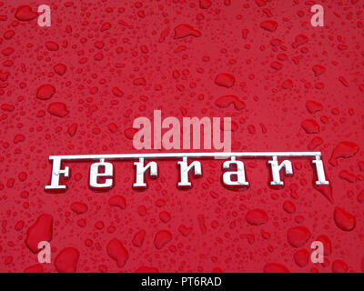 The logo word 'Ferrari' in Chrome on the boot of the Ferrari California Stock Photo