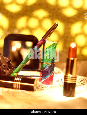 A STILL LIFE OF ASSORTED COSMETICS AMD MAKE UP ACCESSORIES Stock Photo