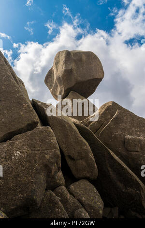 Closeup view of Omu di Cagna (Uomo di Cagna) on the island of Corsica. The granite rock is balanced at the top of a peak on the mountain of Cagna Stock Photo