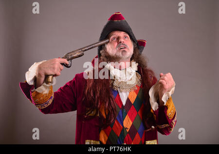 Take my soul, old pirate is going to commit suicide Stock Photo