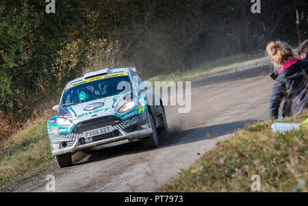 Dyfnant, UK. 6th October 2018. The Ford Fiesta R5 rally car of a competitor on Wales Rally GB 2018 exits a corner on Stage 14, Dyfnant Credit: Mike Hillman/Alamy Live News Stock Photo