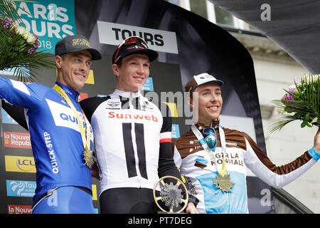 Paris, France. 7th Oct 2018. Soren KRAGH ANDERSEN wins the Paris - Tours 2018 cycle race. He stands with 2nd place winner NIKI TERPSTRA and 3rd place winner BENOIT COSNEFROY. Credit: Julian Elliott/Alamy Live News Credit: Julian Elliott/Alamy Live News Stock Photo