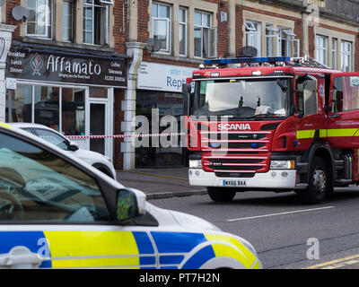 Bournemouth, UK. 7th October 2018. Bournemouth, UK. 7th October 2018. A fire engine and police car attending a fire at the Affamato restaurant in Wimborne Road, Moordown Credit: Clint Westwood/Alamy Live News Stock Photo