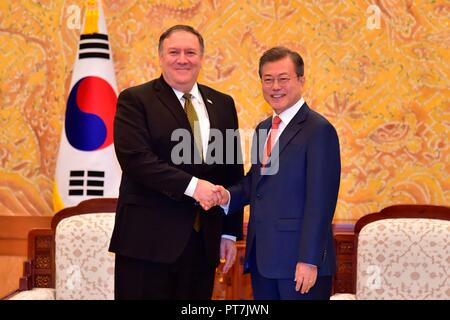 U.S. Secretary of State Mike Pompeo, left, shakes hands with South Korean President Moon Jae-in prior to the start of their bilateral meeting at the Blue House October 7, 2018 in Seoul, South Korea. Pompeo stopped in Korea to brief allies following a round of meetings in North Korea. Stock Photo