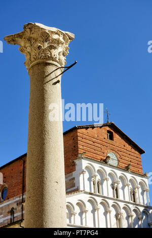 The Santa Maria Forisportam church in Lucca, Italy.This is  a fine example of Pisan Romanesque with the essentially linear facade in Marble with arcad Stock Photo