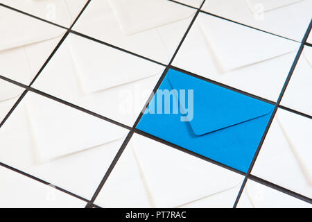 Composition with white and blue envelopes on the table. Different colored envelopes on the table. Stock Photo