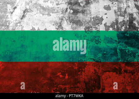 National flag of Bulgaria on the background of the old wall covered with peeling paint Stock Photo
