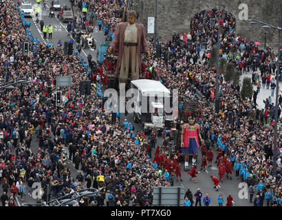 The Royal De Luxe theatre company's 'Giants' street puppets during a street theatre performances in Liverpool. Stock Photo