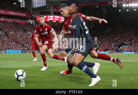 Liverpool's Dejan Lovren clashes with Manchester City's Gabriel Jesus (right) during the Premier League match at Anfield, Liverpool. Stock Photo