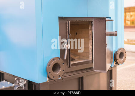 Industrial wood boiler, closeup Stock Photo - Alamy