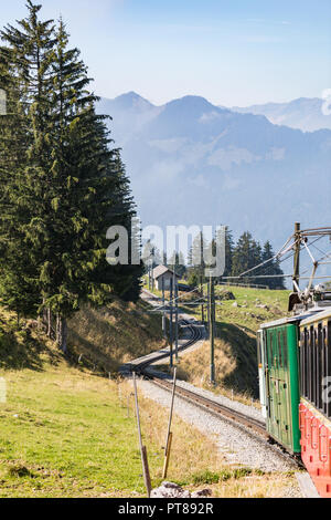 Old passenger train on his way to Schynige Platte from Interlaken. Switzerland Stock Photo