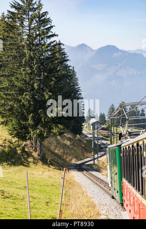 Old passenger train on his way to Schynige Platte from Interlaken. Switzerland Stock Photo