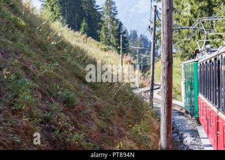 Old passenger train on his way to Schynige Platte from Interlaken. Switzerland Stock Photo