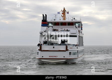 The car ferry Frisia IV arrives on September 27, 2018 in the port of Norderney. Stock Photo