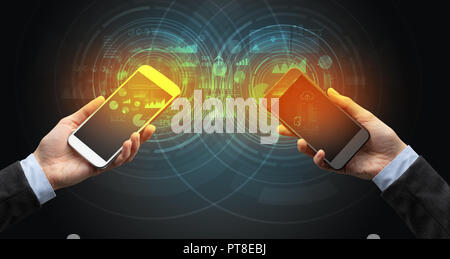 Close up of two smartphones syncing business data Stock Photo - Alamy